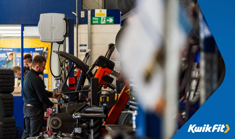 kwik fit tyre machine helping us complete work